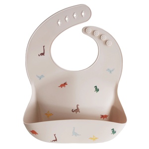 Bavoir silicone Mushie Dino