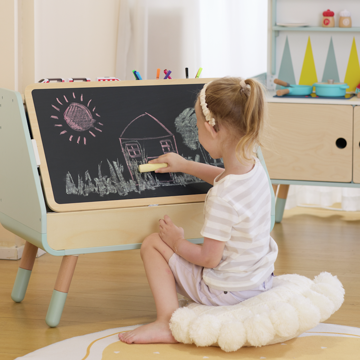 Tableau à dessins-bibliothèque 2 en 1 Hape